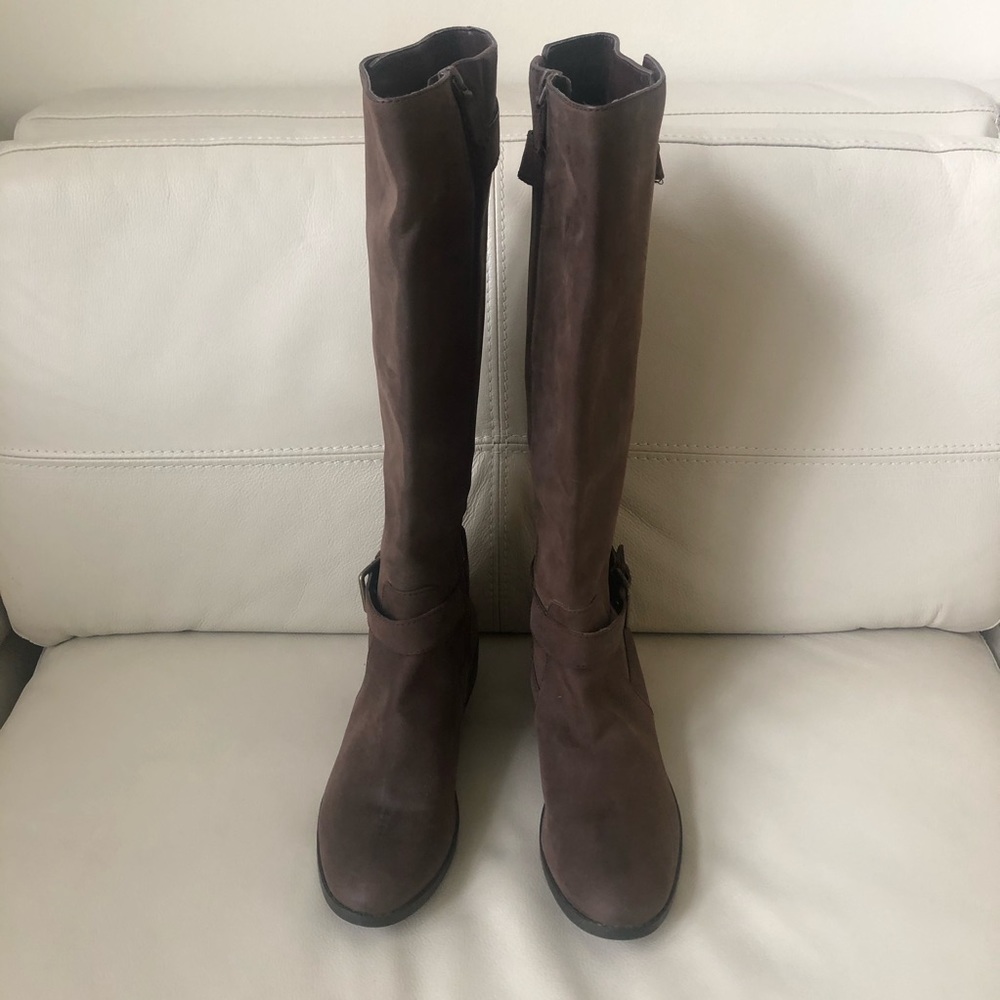 Cole Haan tall brown leather boots.